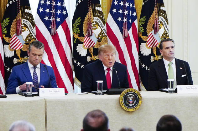 President Donald Trump sits with Defense Secretary ?Pete Hegseth (L) and Attorney General Todd Blanche (R) as he hosts a roundtable discussion on cybercrime in the East Room of the White House in Washington, DC on Wednesday, October 21, 2026. The discussion focuses on combatting foreign-based organized crime targeting Americans online and federal seizures of fraudulent crypto and scam websites.  WAP20261021904 BONNIExCASH