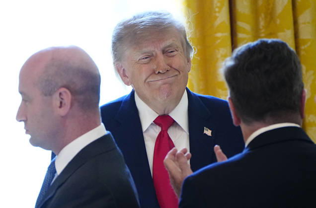 President Donald Trump greets participants as he hosts a roundtable discussion on cybercrime in the East Room of the White House in Washington, DC on Wednesday, October 21, 2026. The discussion focuses on combatting foreign-based organized crime targeting Americans online and federal seizures of fraudulent crypto and scam websites.  WAP20261021901 BONNIExCASH