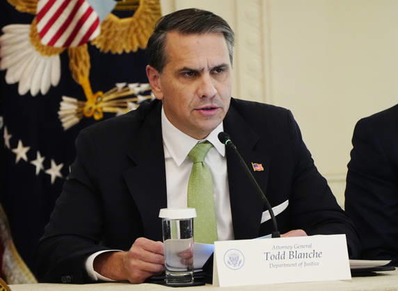Attorney General Todd Blanche speaks during a roundtable discussion on cybercrime in the East Room of the White House in Washington, DC on Wednesday, October 21, 2026. The discussion focuses on combatting foreign-based organized crime targeting Americans online and federal seizures of fraudulent crypto and scam websites.  WAP20261021909 BONNIExCASH