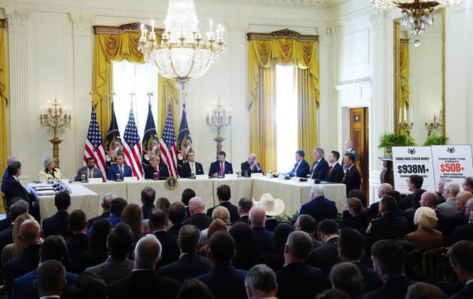 President Donald Trump hosts a roundtable discussion on cybercrime in the East Room of the White House in Washington, DC on Wednesday, October 21, 2026. The discussion focuses on combatting foreign-based organized crime targeting Americans online and federal seizures of fraudulent crypto and scam websites.  WAP20261021922 BONNIExCASH