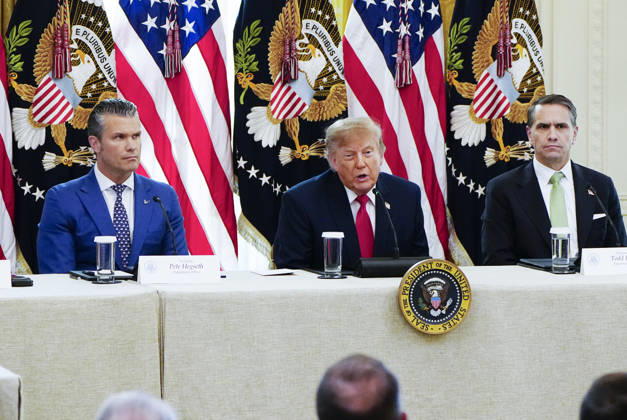 President Donald Trump speaks as Defense Secretary ?Pete Hegseth (L) and Attorney General Todd Blanche (R) listen during a roundtable discussion on cybercrime in the East Room of the White House in Washington, DC on Wednesday, October 21, 2026. The discussion focuses on combatting foreign-based organized crime targeting Americans online and federal seizures of fraudulent crypto and scam websites.  WAP20261021927 BONNIExCASH