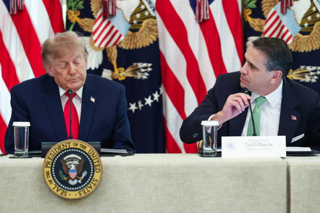 DC: President Trump Hosts Roundtable on Cybercrime at White House President Donald Trump listens as Todd Blanche, U.S. Attorney General, speaks during a roundtable discussion on cybercrime in the East Room of the White House on October 21, 2026 in Washington, D.C. The administration is fighting back against foreign-based organized criminal organizations that exploit Americans in cyberspace and their scam centers and fraud schemes. (Photo by Samuel Corum Pool ABACAPRESS.COM) Washington DC United States  Copyright: xPool ABACAx