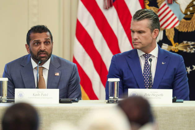 FBI Director Kash Patel speaks as Defense Secretary â Pete Hegseth listens during a roundtable discussion on cybercrime in the East Room of the White House in Washington DC on Wednesday, October 21, 2026.  WAX20261021909 SamuelxCorum
