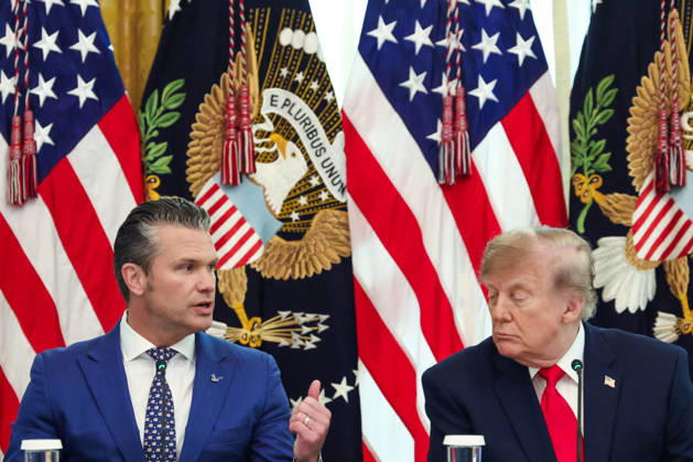 Defense Secretary â Pete Hegseth speaks as President Donald Trump listens speaks during a roundtable discussion on cybercrime in the East Room of the White House in Washington DC on Wednesday, October 21, 2026.  WAX20261021912 SamuelxCorum