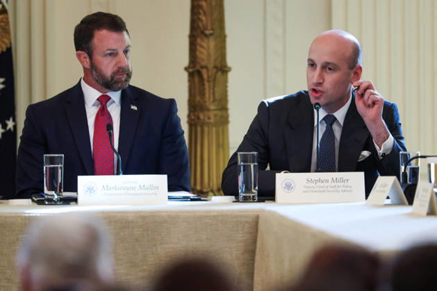 DC: President Trump Hosts Roundtable on Cybercrime at White House Markwayne Mullin, Secretary of Homeland Security, listens as Stephen Miller, White House Deputy Chief of Staff for Policy, speaks during a roundtable discussion on cybercrime in the East Room of the White House on October 21, 2026 in Washington, D.C. The administration is fighting back against foreign-based organized criminal organizations that exploit Americans in cyberspace and their scam centers and fraud schemes. (Photo by Samuel Corum Pool ABACAPRESS.COM) Washington DC United States  Copyright: xPool ABACAx