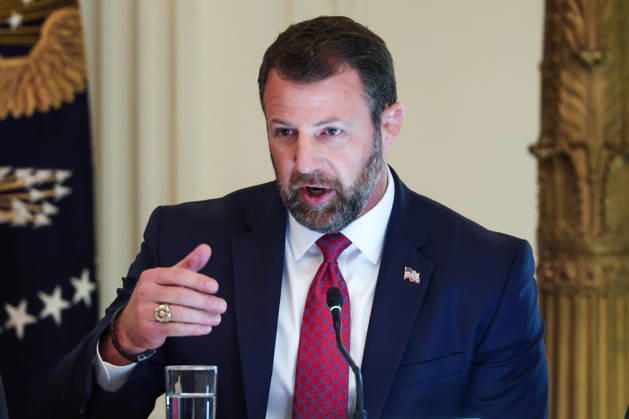 DC: Trump Roundtable on Cybercrime Against Seniors United States Secretary of Homeland Security (DHS) Markwayne Mullin speaks during a roundtable discussion on cybercrime in the East Room of the White House on October 21, 2026 in Washington, D.C. The administration is fighting back against foreign-based organized criminal organizations that exploit Americans in cyberspace and their scam centers and fraud schemes. Credit: CNP AdMedia EDITORIAL USE ONLY  Copyright: xx AdMediax admphotosthree021193