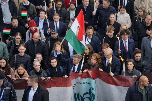 October 22, 2026, Budapest, Hungary: March of the Hungarian Prime Minister s party (Tisza Party) on the eve of the October 23 national holiday, commemorating the 70th anniversary of the 1956 Hungarian Revolution. October 23, 2026, marks the historic 70th anniversary of the 1956 Hungarian Revolution, a nationwide uprising against Soviet occupation and oppressive communist rule. This landmark anniversary is being observed through massive, solemn, and highly modernized nationwide commemorations across Hungary. Budapest Hungary - ZUMAp159 20261022_int_p159_522 Copyright: xPPANKx