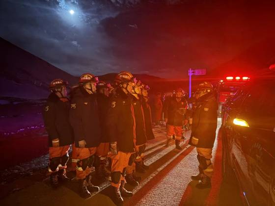 (261023) -- BEIJING, Oct. 23, 2026 -- Firefighters arrive at an earthquake-hit village in Baqen County of Nagqu City in southwest China s Xizang Autonomous Region, on Oct. 23, 2026. Sixteen people were killed and 32 others injured after a 7.0-magnitude earthquake struck Baqen County of Nagqu City in southwest China s Xizang Autonomous Region at 10:33 p.m. Thursday (Beijing Time), according to the city s emergency management bureau. As of 2:25 a.m. Friday, 11 of the injured were in serious condition while 21 sustained minor injuries. Over 300 houses collapsed. The damage caused by the quake is being further evaluated, and disaster relief work is underway. More than 300 police officers have been dispatched to the epicenter for relief 