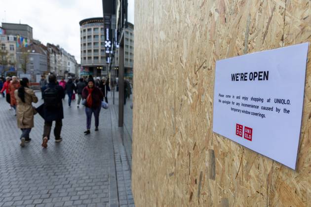 Storefronts boarded up with wooden panels at Rue Neuve Nieuwstraat, in Brussels, on Friday 23 October 2026. Stores are preparing for another protest scheduled for Saturday.  NICOLASxMAETERLINCK 190739544