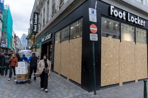 Storefronts boarded up with wooden panels at Rue Neuve Nieuwstraat, in Brussels, on Friday 23 October 2026. Stores are preparing for another protest scheduled for Saturday.  NICOLASxMAETERLINCK 190739531