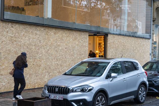 Storefronts boarded up with wooden panels, in Brussels, on Friday 23 October 2026. Stores are preparing for another protest scheduled for Saturday.  NICOLASxMAETERLINCK 190744618
