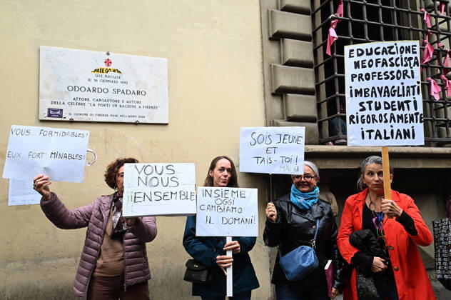 October 23, 2026, Florence, Italia, Italy: In front of the Machiavelli High School on Via Santo Spirito, a group of teachers held an open lesson on the street with megaphones and signs, addressing students leaning out of their windows and standing in front of the occupied school s door. Florence, October 23, 2026 Florence Italy  - ZUMAa289 20261023_zia_a289_117 Copyright: xAleandroxBiagiantix xAgfx
