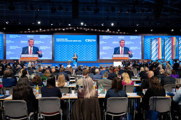 Munich, Bavaria, Germany October 23, 2026: The 2026 convention of the CSU (Christian Social Union) at the Munich Trade Fair Center. A view of the exhibition hall while Minister President Dr. Markus Söder speaks on stage
