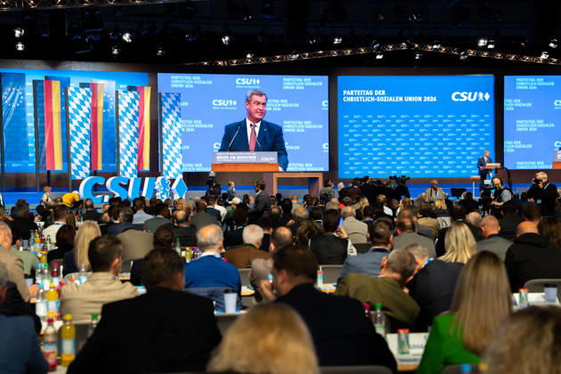 Munich, Bavaria, Germany October 23, 2026: The 2026 convention of the CSU (Christian Social Union) at the Munich Trade Fair Center. A view of the exhibition hall while Minister President Dr. Markus Söder speaks on stage