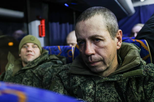 RUSSIA, MOSCOW REGION - OCTOBER 23, 2026: Russian servicemen released from Ukrainian captivity are seen in a bus. Georgy Chernyshov TASS  99833322