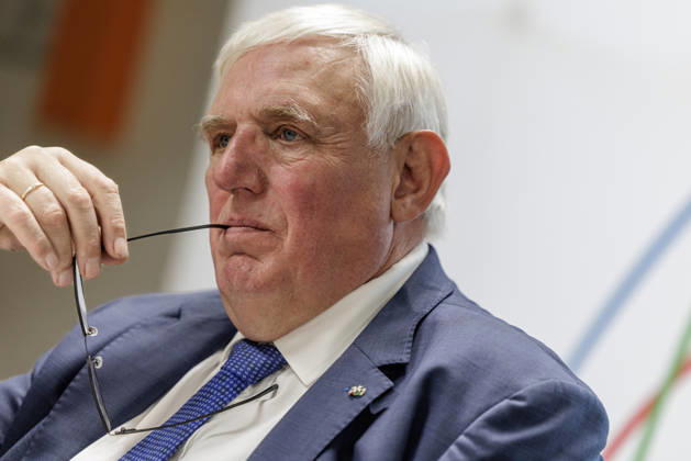 Karl Josef Laumann (CDU), Minister of Labor and Social Affairs for North Rhine-Westphalia, held the arm of his glasses in the corner of his mouth on October 23, 2026, during a WVS business breakfast at the Caritas Emstor Workshops (WfbM) in Rheine, North Rhine