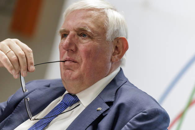 Karl Josef Laumann (CDU), Minister of Labor and Social Affairs for North Rhine-Westphalia, held the arm of his glasses in the corner of his mouth on October 23, 2026, during a WVS business breakfast at the Caritas Emstor Workshops (WfbM) in Rheine, North Rhine