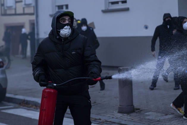 Demonstration and clashes between protesters and police in Strasbourg STRASBOURG, FRANCE - OCTOBER 24: Protesters clash with law enforcement officers during a demonstration in the city centre of Strasbourg, France on October 24, 2026. Police officers intervene to disperse groups of protesters as tear gas is deployed. Clashes, projectile throwing and property damage are reported in several streets. Barricades and burning vehicles reflect the tense situation surrounding the protest. Elyxandro Cegarra Anadolu Strasbourg France. Editorial use only. Please get in touch for any other usage.  Copyright: x2026xAnadoluxElyxandroxCegarrax