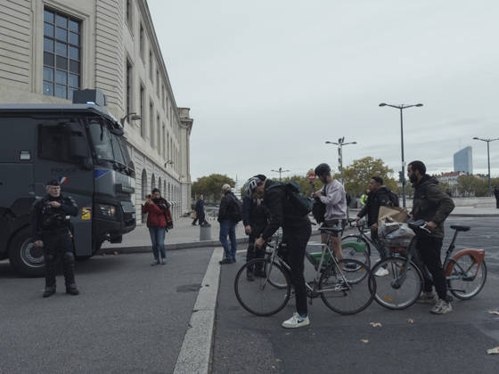 Lyon France Anti-Government Protest Cyclists are questioned by police officers beside a police vehicle in Lyon, France, on October 24, 2026. Police maintained a presence in Lyon as authorities restricted gatherings in parts of the city following unrest during demonstrations the previous weekend. Lyon Rhone Alpes France Copyright: xAbolfazlxSalmanzadehx