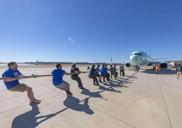 October 24, 2026, Santa Barbara, California, USA: Teams compete in the 5th annual Alpha Resource Center Plane Pull, trying to pull a 140,000-pound Alaska Airlines 737 jetliner 20 feet in the fastest time. The event is a fundraiser for the Alpha Resource Center, a nonprofit serving people with disabilities and their families. Santa Barbara USA - ZUMAh13_ 20261024_zaf_h13_001 Copyright: xPJxHellerx