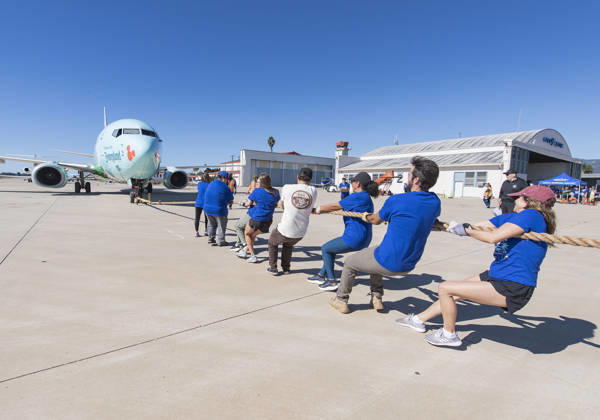 October 24, 2026, Santa Barbara, California, USA: Teams compete in the 5th annual Alpha Resource Center Plane Pull, trying to pull a 140,000-pound Alaska Airlines 737 jetliner 20 feet in the fastest time. The event is a fundraiser for the Alpha Resource Center, a nonprofit serving people with disabilities and their families. Santa Barbara USA - ZUMAh13_ 20261024_zaf_h13_003 Copyright: xPJxHellerx