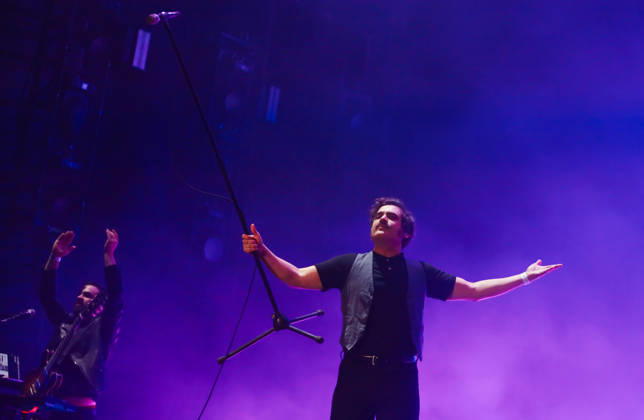 October 24, 2026, Tijuana, Baja California, Mexico: October 24, 2026, Tijuana, Baja California, Mexico: Lead singer Luis Humberto Navejas of Mexican rock band Enjambre gestures to the crowd while holding his microphone stand during their performance at Tecate Peninsula 2026 in Parque Morelos, Tijuana. Tijuana Mexico - ZUMAm311 20261024_zip_m311_020 Copyright: xAlbertoxMartinezx