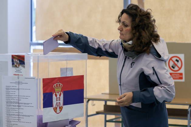 SERBIA, BELGRADE - OCTOBER 25, 2026: A woman casts her ballot at a polling station during the 2026 Serbian parliamentary election. On 25 October, the Serbs went to the polls to elect members of the country s unicameral parliament, Narodna Skupshtina. Alexander Ryumin TASS  99928893