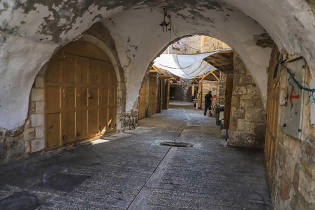 Hebron streets remain deserted as Israeli military restrictions enter third day HEBRON, WEST BANK, PALESTINE - OCTOBER 25: Shops remain closed in the Old City of Hebron in West Bank, Palestine on October 25, 2026, as Israeli forces continue to block all entrances and exits to the city and surrounding villages for a third consecutive day following a clash at a checkpoint that left two Palestinians and two Israeli soldiers dead. Streets remain quiet as local shopkeepers keep their businesses closed amid the restrictions. Amer Shallodi Anadolu Hebron West Bank. Editorial use only. Please get in touch for any other usage.  Copyright: x2026xAnadoluxAmerxShallodix