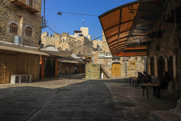 Hebron streets remain deserted as Israeli military restrictions enter third day HEBRON, WEST BANK, PALESTINE - OCTOBER 25: Shops remain closed in the Old City of Hebron in West Bank, Palestine on October 25, 2026, as Israeli forces continue to block all entrances and exits to the city and surrounding villages for a third consecutive day following a clash at a checkpoint that left two Palestinians and two Israeli soldiers dead. Streets remain quiet as local shopkeepers keep their businesses closed amid the restrictions. Amer Shallodi Anadolu Hebron West Bank. Editorial use only. Please get in touch for any other usage.  Copyright: x2026xAnadoluxAmerxShallodix