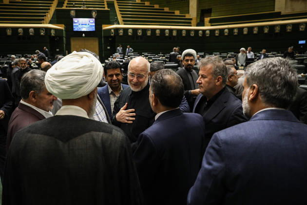 October 25, 2026, Tehran, Iran: Mohammad Bagher Ghalibaf places a hand on his chest while speaking with a group of lawmakers in the chamber at the Islamic Consultative Assembly in Tehran, Iran, on October 25, 2026. The Iranian parliament held a hybrid open sitting, with some lawmakers attending in the Tehran chamber and others participating remotely, according to parliamentary reports. Tehran Iran - ZUMAi98_ 20261025_zih_i98_038 Copyright: xIcanax