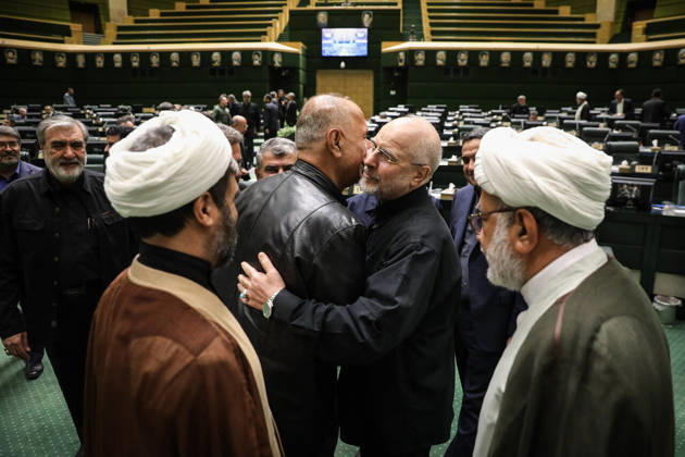 October 25, 2026, Tehran, Iran: Mohammad Bagher Ghalibaf raises his hand to the side of another man s face while speaking between two clerics at the Islamic Consultative Assembly in Tehran, Iran, on October 25, 2026. The Islamic Consultative Assembly resumed an open sitting in its Tehran chamber with a mix of in-person and remote participation, according to parliamentary reporting. Tehran Iran - ZUMAi98_ 20261025_zih_i98_059 Copyright: xIcanax