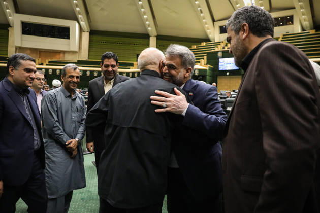 October 25, 2026, Tehran, Iran: Mohammad Bagher Ghalibaf is greeted by several suited men as one of them touches another man s shoulder at the Islamic Consultative Assembly in Tehran, Iran, on October 25, 2026. The Islamic Consultative Assembly resumed an open sitting in its Tehran chamber with a mix of in-person and remote participation, according to parliamentary reporting. Tehran Iran - ZUMAi98_ 20261025_zih_i98_056 Copyright: xIcanax