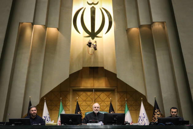 October 25, 2026, Tehran, Iran: Mohammad Bagher Ghalibaf presides from the front desk beneath Iran s national emblem and several flags at the Islamic Consultative Assembly in Tehran, Iran, on October 25, 2026. The Islamic Consultative Assembly resumed an open sitting in its Tehran chamber with a mix of in-person and remote participation, according to parliamentary reporting. Tehran Iran - ZUMAi98_ 20261025_zih_i98_090 Copyright: xIcanax
