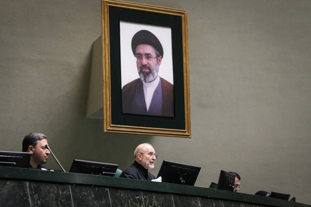 October 25, 2026, Tehran, Iran: Mohammad Bagher Ghalibaf sits at the speaker s desk beneath a large framed portrait on the wall at the Islamic Consultative Assembly in Tehran, Iran, on October 25, 2026. The Iranian parliament held a hybrid open sitting, with some lawmakers attending in the Tehran chamber and others participating remotely, according to parliamentary reports. Tehran Iran - ZUMAi98_ 20261025_zih_i98_096 Copyright: xIcanax