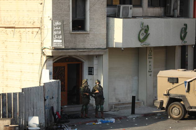 Strict security measures enforced in Hebron s Deir Bahha neighborhood HEBRON, WEST BANK, PALESTINE - OCTOBER 25: Israeli soldiers enforce strict security measures and maintain a military blockade in the Deir Bahha neighborhood of Hebron, West Bank, Palestine on October 25, 2026. The wide-scale military operation entered its third day following an armed attack at an Israeli military checkpoint in the Farsh al-Hawa area at the city s northwestern entrance on October 23, with troops sealing off roads and patrolling residential areas where the two Palestinian suspects involved in the incident lived. Wisam Hashlamoun Anadolu Hebron West Bank. Editorial use only. Please get in touch for any other usage.  Copyright: x2026xAnadoluxWisamxHashlamounx