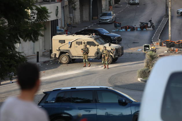Strict security measures enforced in Hebron s Deir Bahha neighborhood HEBRON, WEST BANK, PALESTINE - OCTOBER 25: Israeli soldiers enforce strict security measures and maintain a military blockade in the Deir Bahha neighborhood of Hebron, West Bank, Palestine on October 25, 2026. The wide-scale military operation entered its third day following an armed attack at an Israeli military checkpoint in the Farsh al-Hawa area at the city s northwestern entrance on October 23, with troops sealing off roads and patrolling residential areas where the two Palestinian suspects involved in the incident lived. Wisam Hashlamoun Anadolu Hebron West Bank. Editorial use only. Please get in touch for any other usage.  Copyright: x2026xAnadoluxWisamxHashlamounx