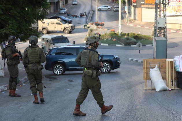 Strict security measures enforced in Hebron s Deir Bahha neighborhood HEBRON, WEST BANK, PALESTINE - OCTOBER 25: Israeli soldiers enforce strict security measures and maintain a military blockade in the Deir Bahha neighborhood of Hebron, West Bank, Palestine on October 25, 2026. The wide-scale military operation entered its third day following an armed attack at an Israeli military checkpoint in the Farsh al-Hawa area at the city s northwestern entrance on October 23, with troops sealing off roads and patrolling residential areas where the two Palestinian suspects involved in the incident lived. Wisam Hashlamoun Anadolu Hebron West Bank. Editorial use only. Please get in touch for any other usage.  Copyright: x2026xAnadoluxWisamxHashlamounx