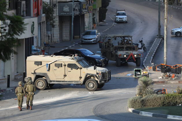 Strict security measures enforced in Hebron s Deir Bahha neighborhood HEBRON, WEST BANK, PALESTINE - OCTOBER 25: Israeli soldiers enforce strict security measures and maintain a military blockade in the Deir Bahha neighborhood of Hebron, West Bank, Palestine on October 25, 2026. The wide-scale military operation entered its third day following an armed attack at an Israeli military checkpoint in the Farsh al-Hawa area at the city s northwestern entrance on October 23, with troops sealing off roads and patrolling residential areas where the two Palestinian suspects involved in the incident lived. Wisam Hashlamoun Anadolu Hebron West Bank. Editorial use only. Please get in touch for any other usage.  Copyright: x2026xAnadoluxWisamxHashlamounx