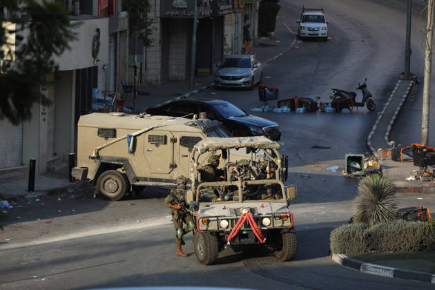 Strict security measures enforced in Hebron s Deir Bahha neighborhood HEBRON, WEST BANK, PALESTINE - OCTOBER 25: Israeli soldiers enforce strict security measures and maintain a military blockade in the Deir Bahha neighborhood of Hebron, West Bank, Palestine on October 25, 2026. The wide-scale military operation entered its third day following an armed attack at an Israeli military checkpoint in the Farsh al-Hawa area at the city s northwestern entrance on October 23, with troops sealing off roads and patrolling residential areas where the two Palestinian suspects involved in the incident lived. Wisam Hashlamoun Anadolu Hebron West Bank. Editorial use only. Please get in touch for any other usage.  Copyright: x2026xAnadoluxWisamxHashlamounx
