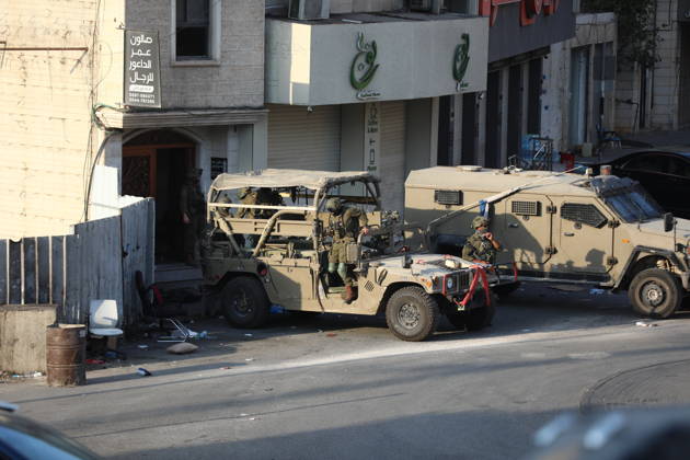 Strict security measures enforced in Hebron s Deir Bahha neighborhood HEBRON, WEST BANK, PALESTINE - OCTOBER 25: Israeli soldiers enforce strict security measures and maintain a military blockade in the Deir Bahha neighborhood of Hebron, West Bank, Palestine on October 25, 2026. The wide-scale military operation entered its third day following an armed attack at an Israeli military checkpoint in the Farsh al-Hawa area at the city s northwestern entrance on October 23, with troops sealing off roads and patrolling residential areas where the two Palestinian suspects involved in the incident lived. Wisam Hashlamoun Anadolu Hebron West Bank. Editorial use only. Please get in touch for any other usage.  Copyright: x2026xAnadoluxWisamxHashlamounx