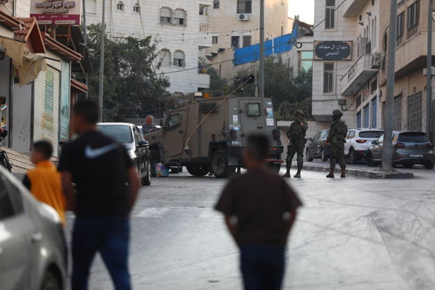 Strict security measures enforced in Hebron s Deir Bahha neighborhood HEBRON, WEST BANK, PALESTINE - OCTOBER 25: Israeli soldiers enforce strict security measures and maintain a military blockade in the Deir Bahha neighborhood of Hebron, West Bank, Palestine on October 25, 2026. The wide-scale military operation entered its third day following an armed attack at an Israeli military checkpoint in the Farsh al-Hawa area at the city s northwestern entrance on October 23, with troops sealing off roads and patrolling residential areas where the two Palestinian suspects involved in the incident lived. Wisam Hashlamoun Anadolu Hebron West Bank. Editorial use only. Please get in touch for any other usage.  Copyright: x2026xAnadoluxWisamxHashlamounx