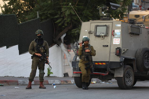 Strict security measures enforced in Hebron s Deir Bahha neighborhood HEBRON, WEST BANK, PALESTINE - OCTOBER 25: Israeli soldiers enforce strict security measures and maintain a military blockade in the Deir Bahha neighborhood of Hebron, West Bank, Palestine on October 25, 2026. The wide-scale military operation entered its third day following an armed attack at an Israeli military checkpoint in the Farsh al-Hawa area at the city s northwestern entrance on October 23, with troops sealing off roads and patrolling residential areas where the two Palestinian suspects involved in the incident lived. Wisam Hashlamoun Anadolu Hebron West Bank. Editorial use only. Please get in touch for any other usage.  Copyright: x2026xAnadoluxWisamxHashlamounx