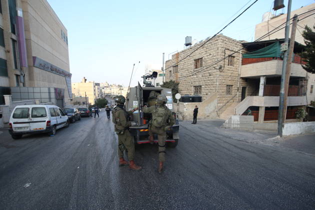 Strict security measures enforced in Hebron s Deir Bahha neighborhood HEBRON, WEST BANK, PALESTINE - OCTOBER 25: Israeli soldiers enforce strict security measures and maintain a military blockade in the Deir Bahha neighborhood of Hebron, West Bank, Palestine on October 25, 2026. The wide-scale military operation entered its third day following an armed attack at an Israeli military checkpoint in the Farsh al-Hawa area at the city s northwestern entrance on October 23, with troops sealing off roads and patrolling residential areas where the two Palestinian suspects involved in the incident lived. Wisam Hashlamoun Anadolu Hebron West Bank. Editorial use only. Please get in touch for any other usage.  Copyright: x2026xAnadoluxWisamxHashlamounx