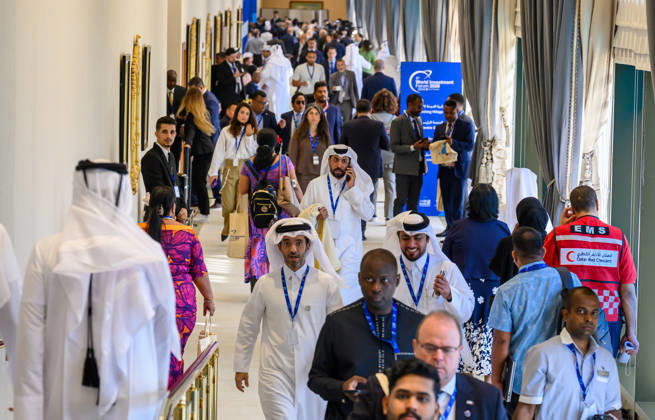 October 25, 2026, Doha, Qatar: Delegates walk through a crowded hallway during the opening day of 9th World Investment Forum (WIF 2026). The three-day summit, organized by United Nations Conference on Trade and Development Doha Qatar  - ZUMAs197 20261025_aaa_s197_087 Copyright: xNoushadxVariyattiyakkalx