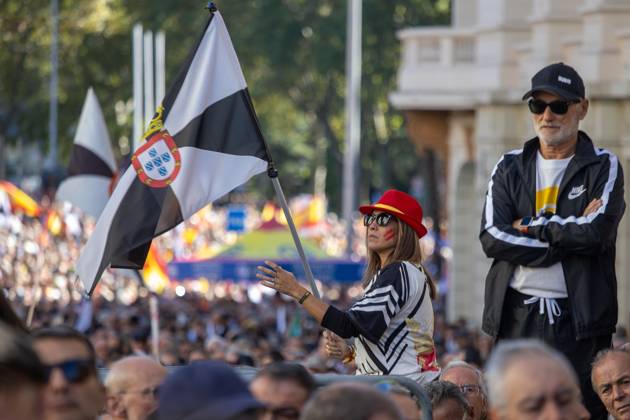 October 25, 2026, Madrid, Spain: A woman waves a flag of Ceuta..Thousands of people in Madrid have rallied in support of the demands made by women from CeutaÃ¢â‚¬known locally as caballas Ã¢â‚¬who are calling for a return to normalcy in the autonomous city. Madrid Spain  - ZUMAs197 20261025_aaa_s197_111 Copyright: xDavidxCanalesx