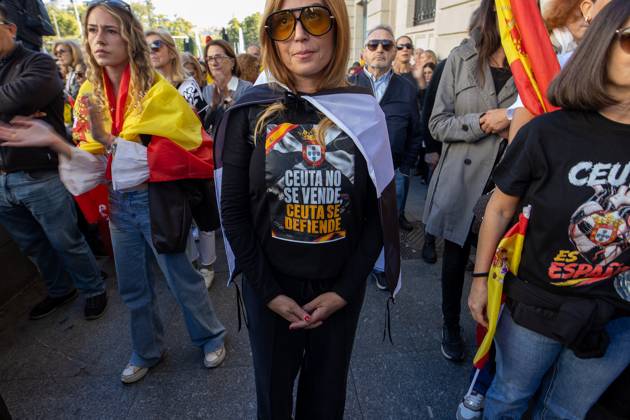 October 25, 2026, Madrid, Spain: A woman wears a T-shirt in support of the autonomous city of Ceuta..Thousands of people in Madrid have rallied in support of the demands made by women from CeutaÃ¢â‚¬known locally as caballas Ã¢â‚¬who are calling for a return to normalcy in the autonomous city. Madrid Spain  - ZUMAs197 20261025_aaa_s197_113 Copyright: xDavidxCanalesx