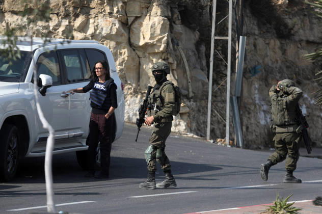 (261025) -- HEBRON, Oct. 25, 2026 -- Israeli soldiers patrol during a military operation in the West Bank city of Hebron, on Oct. 25, 2026. Israeli military operations continue in Hebron for the third consecutive day, amid ongoing closures and military movements. (Photo by Xinhua) MIDEAST-HEBRON-MILITARY-OPERATION MamounxWazwaz 
