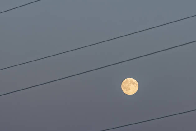 Full Moon Over Arzdorf in Wachtberg, October 25, 2026: The full moon over Arzdorf in Wachtberg behind power lines. The photos were taken at dusk in Wachtberg, Arzdorf, North Rhine-Westphalia, Germany. Copyright: xMarcxJohnx