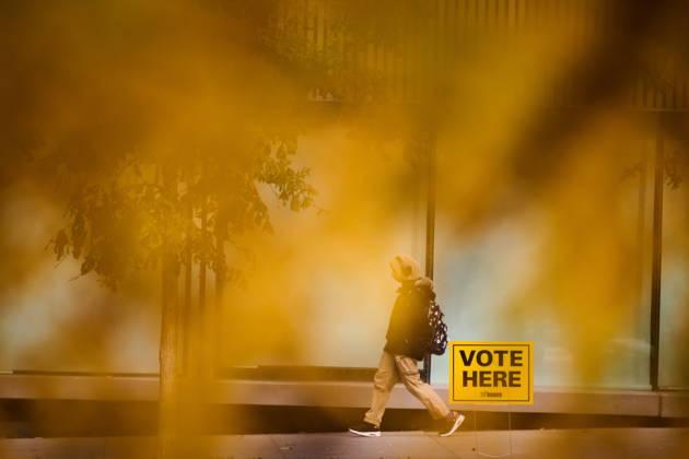 October 26, 2026, Toronto, On, Canada: People pass election signage as they head to the polls to vote in Toronto s municipal election, on Monday, Oct. 26, 2026. Toronto Canada  - ZUMAc35_ 20261026_zaf_c35_045 Copyright: xSammyxKoganx
