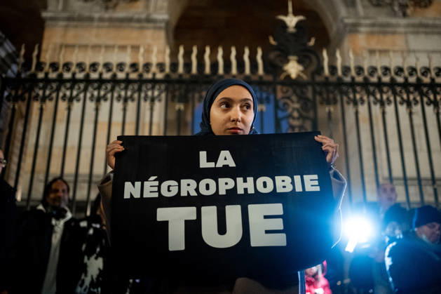 Rally in Lyon following the attacks in Trappes and La Verrière on October 26, 2026. Nicolas Liponne MAXPPP Lyon 10 26 2026. A person holding a sign that reads Negrophobia Kills, during the rally in memory of Pengo Bossio Wangi, who was killed in the racist terrorist attack in Trappes and La Verrière on October 23, 2026, in front of Lyon City Hall, October 26, 2026 A person holding a sign that reads Negrophobia Kills during a rally in memory of Pengo Bossio Wangi, who was killed in the racist terrorist attack in Trappes and La Verrière on October 23, 2026, in front of Lyon City Hall on October 26, 2026. Lyon, Auvergne-Rhône-Alpes, France Copyright: xMAXPPPxNicolasxLiponnex NLP202610265001 NLP202610265001